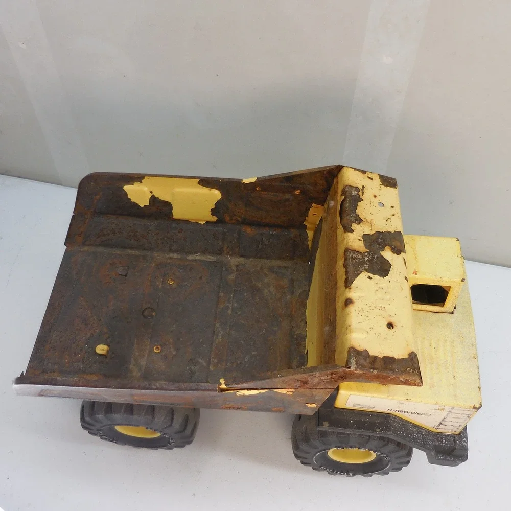 Vintage Tonka Turbo-Diesel Pressed Steel Dump Truck Yellow XMB-975 Rust Patina